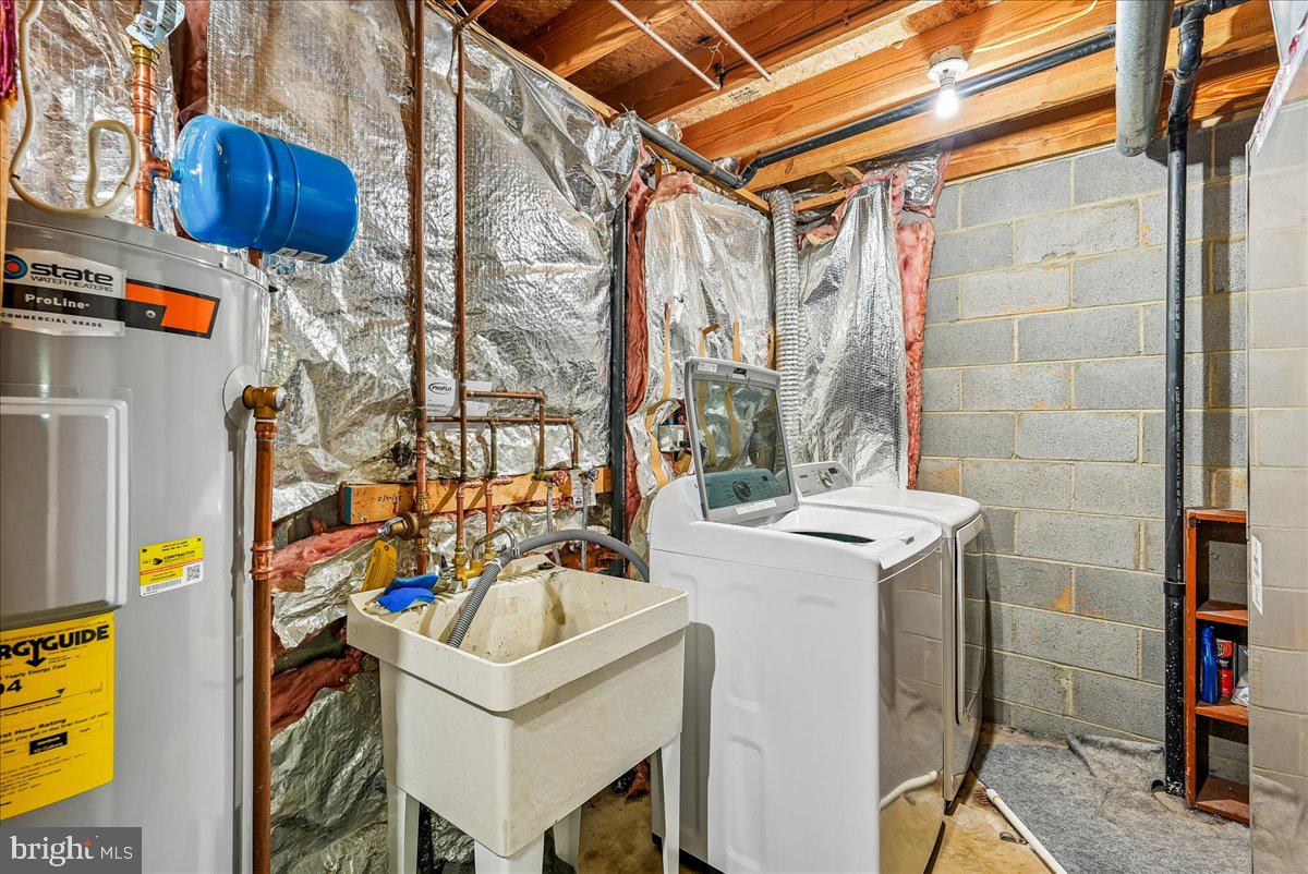 2331 Middle Creek Lane Reston, VA 20191 - Photo 46 of 78 a utility room with dryer and washer