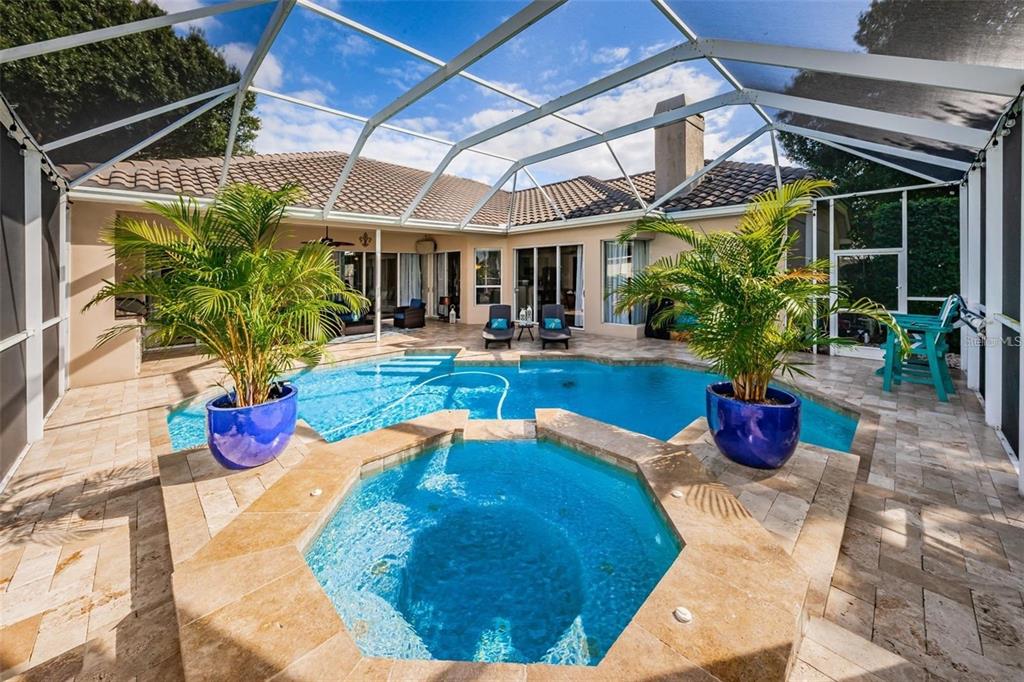1203 Hagen Drive Trinity, FL 34655 - Photo 4 of 21 a view of a chairs and table in the patio