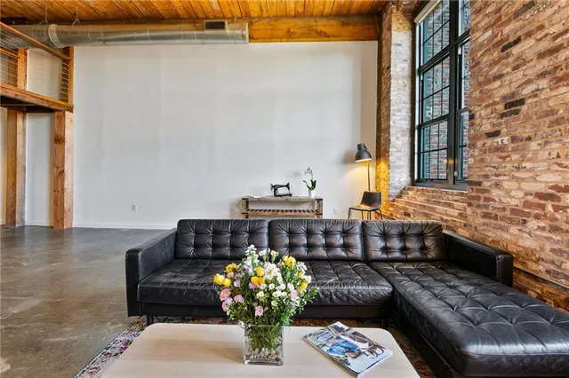 a living room with couches and furniture