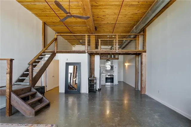 a view of an entryway with wooden floor