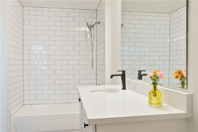 a bathroom with a sink and a bathtub