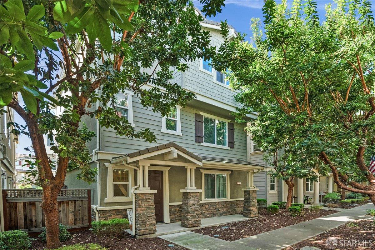 79 Middleton Place Hayward, CA 94544 - Photo 1 of 1 a front view of a house with a garden
