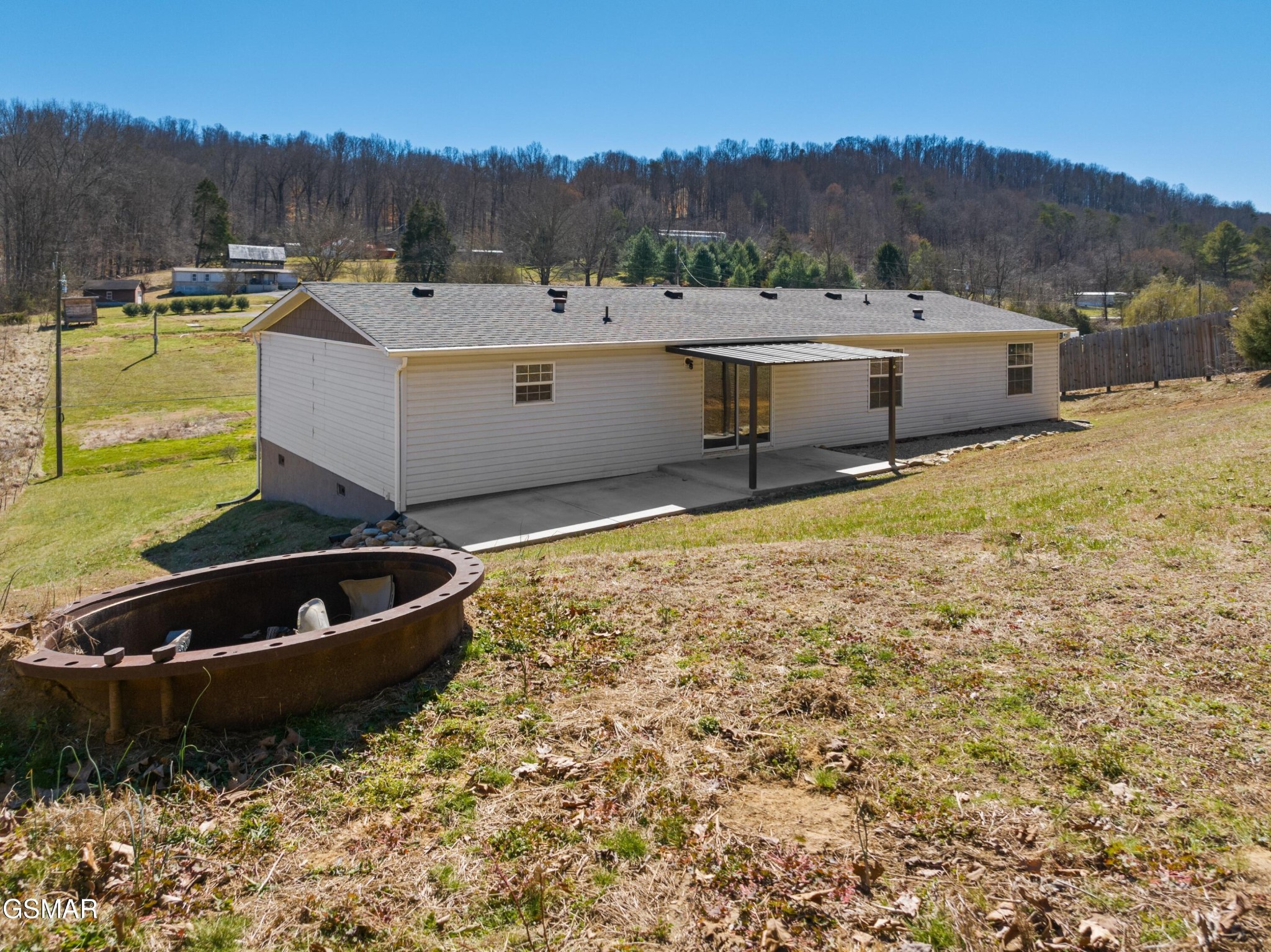 1570 Little Valley Road Maynardville, TN 37807 - Photo 4 of 31 a view of a backyard with a tub and a garden