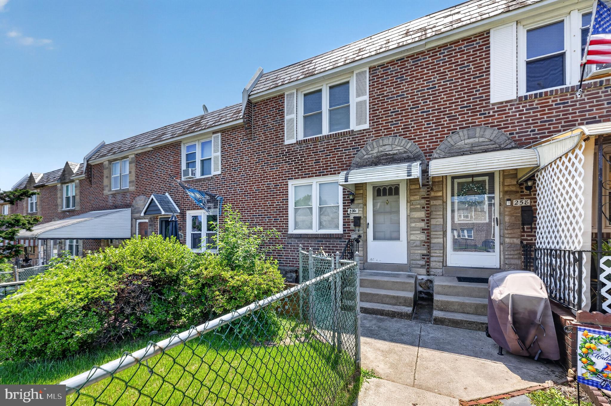 256 Cambridge Road Clifton Heights, PA 19018 - Photo 7 of 30 Charming brick townhomes with greenery.