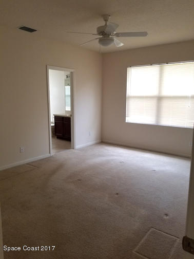 993 Riviera Point Drive Rockledge, FL 32955 - Photo 12 of 25 Master Bedroom