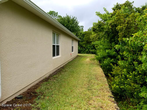 993 Riviera Point Drive Rockledge, FL 32955 - Photo 24 of 25 Side yard