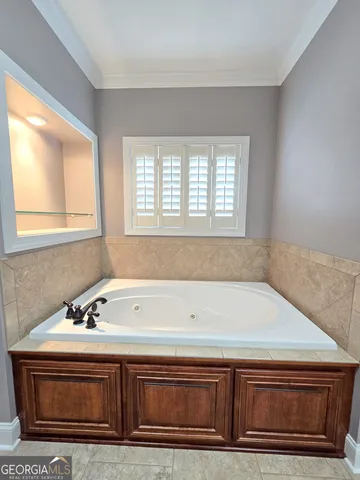 a bathroom with a sink and a bathtub