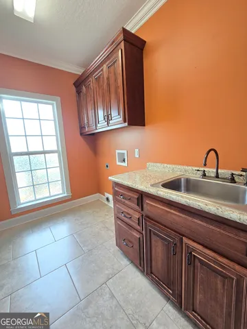 a view of an empty room with a floor to ceiling windows with wooden floor