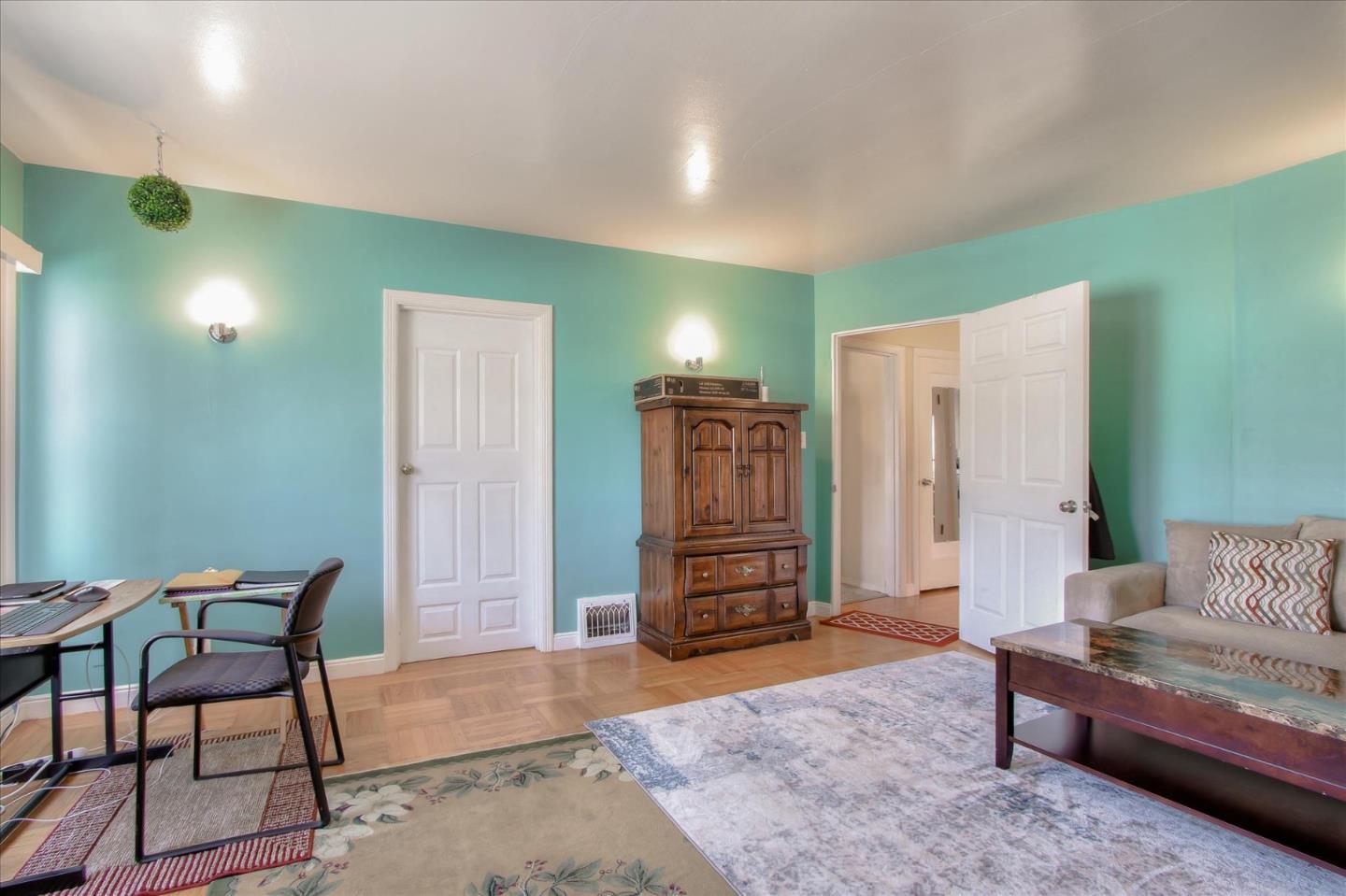 Willits Street Daly City, CA 94014 - Photo 23 of 50 a living room with furniture and a walk in closet