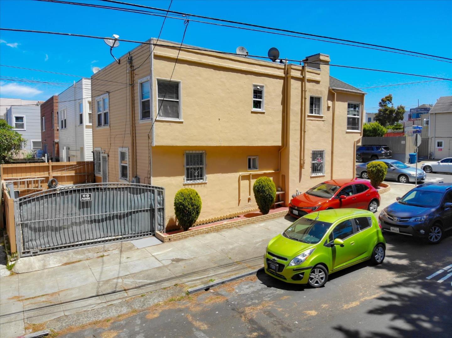 Willits Street Daly City, CA 94014 - Photo 50 of 50 a front view of a house with a garden and parking