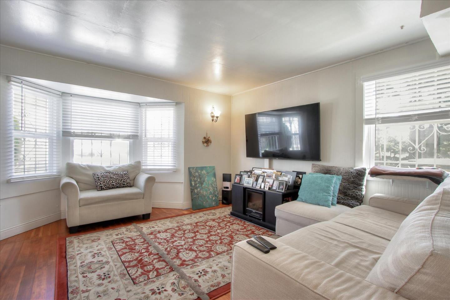 Willits Street Daly City, CA 94014 - Photo 10 of 50 a living room with furniture and a flat screen tv