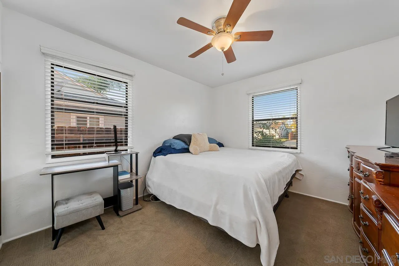 1225 Andover Road El Cajon, CA 92019 - Photo 16 of 27 a bedroom with a bed and a window