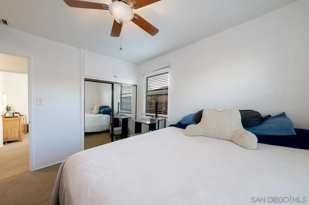 1225 Andover Road El Cajon, CA 92019 - Photo 17 of 27 a bedroom with a bed and window