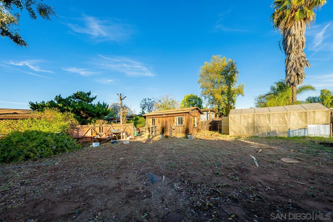1225 Andover Road El Cajon, CA 92019 - Photo 25 of 27 a front view of a house with a yard
