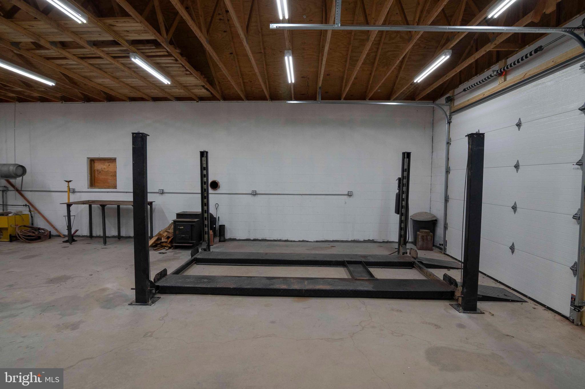 3225 Magnolia Road Great Cacapon, WV 25422 - Photo 16 of 59 a living room with gym equipment