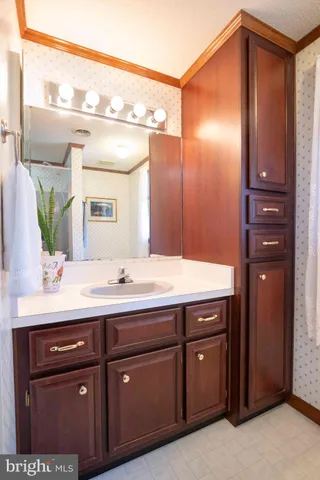 a bathroom with a shower and a bath tub