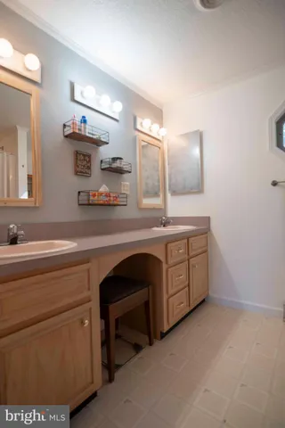 a bathroom with a toilet and a sink
