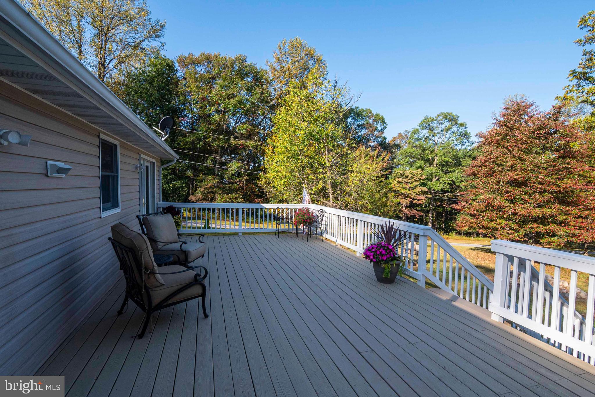 3225 Magnolia Road Great Cacapon, WV 25422 - Photo 32 of 59 a view of balcony with wooden floor and seating space