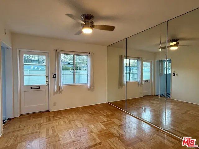 a bathroom with a sink a vanity and a toilet