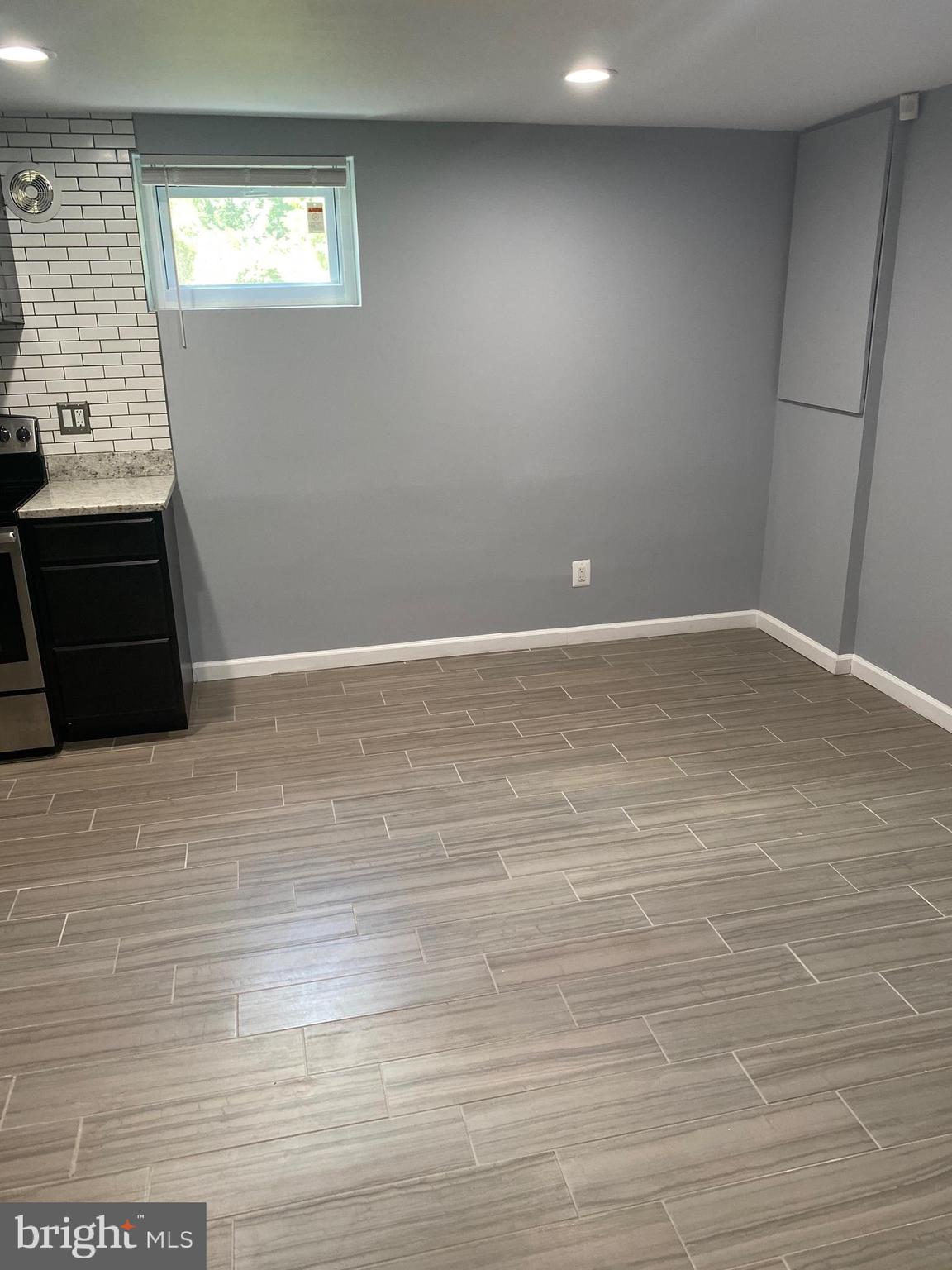 5806 Burgess Road District Heights, MD 20747 - Photo 9 of 11 a view of an empty room with a window