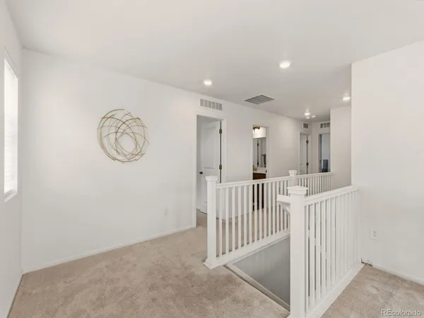 a view of a hallway with entryway