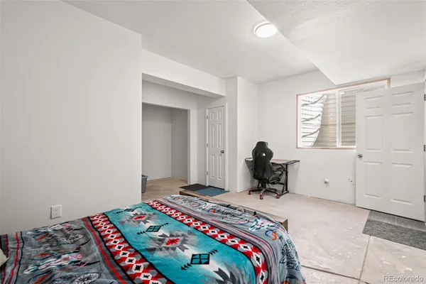 a view of roof deck with wooden fence