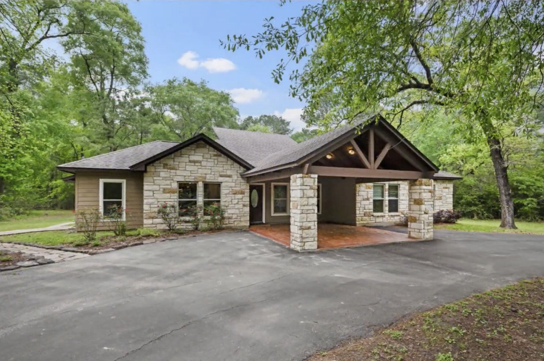 30338 Riley Road Waller, TX 77484 - Photo 5 of 46 a view of a house with a yard