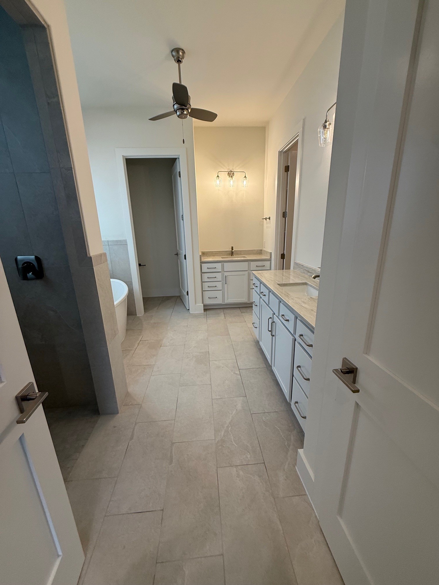 110 Firestone Place Meadowlakes, TX 78654 - Photo 10 of 18 Spacious bathroom featuring light-toned tile flooring