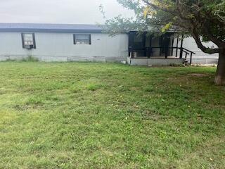 6806 North County Road 1630 Shallowater, TX 79363 - Photo 13 of 40 a house view with a garden space
