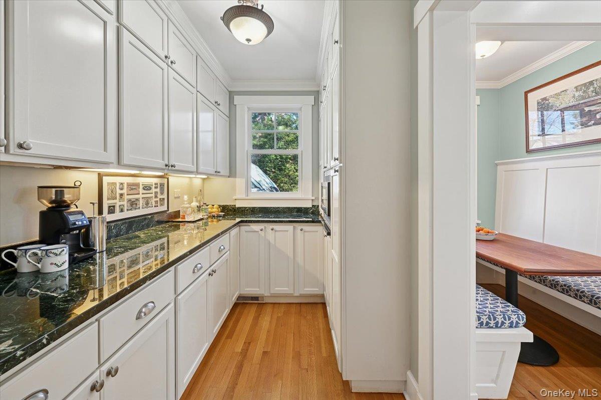 31 Emerson Road Larchmont, NY 10538 - Photo 13 of 39 The butler's pantry serves as a coffee station, bar area and pantry. The breakfast nook is to the right.