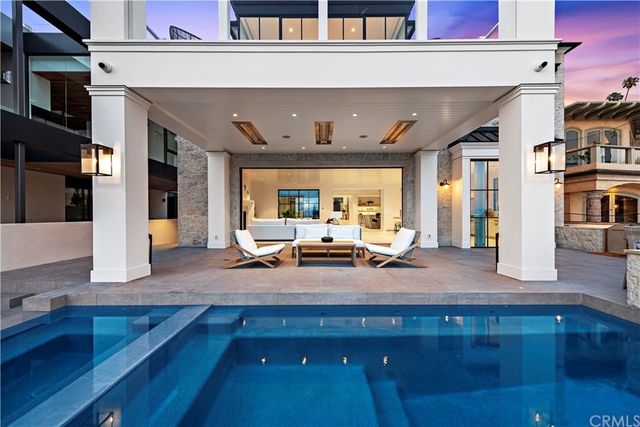 a view of a living room and entryway