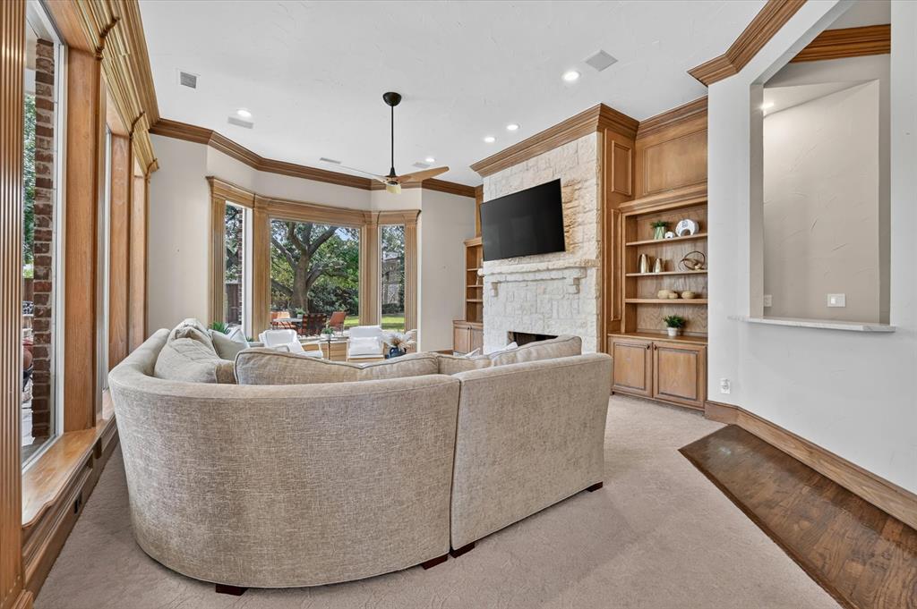 6416 Riverside Drive Plano, TX 75024 - Photo 13 of 35 Living area with extensive wood trim and a bay window