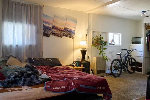 a front view of a house with a yard and pathway