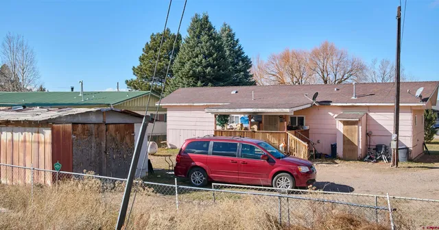a view of a workspace with furniture