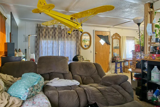 a view of a street with stores