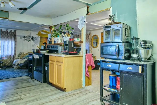 a bed room with a bed and a window