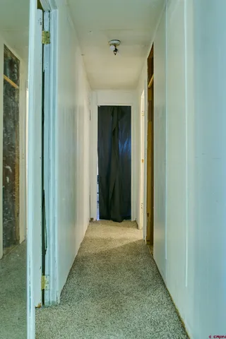 a bathroom with a sink mirror and vanity