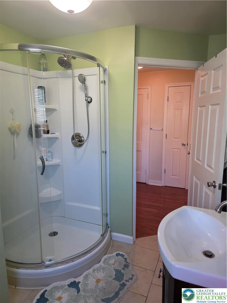 189 West Berger Street Emmaus, PA 18049 - Photo 13 of 26 a bathroom with a sink and a shower
