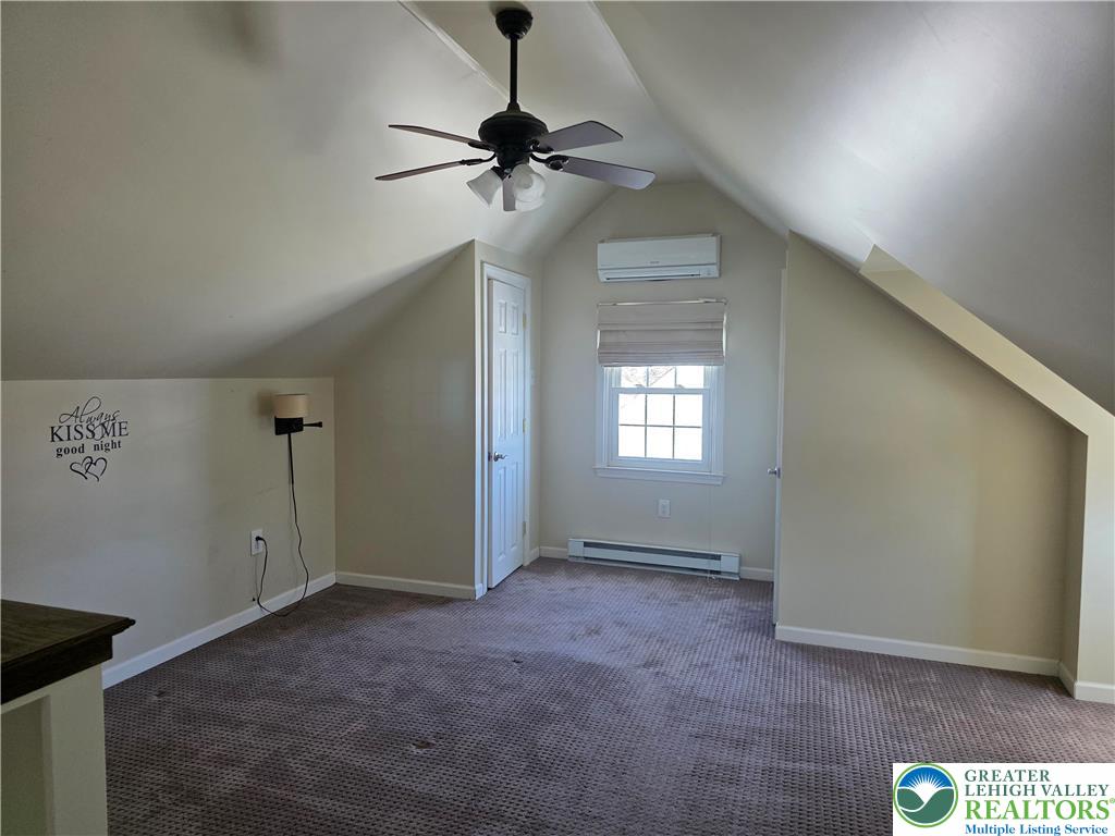 189 West Berger Street Emmaus, PA 18049 - Photo 15 of 26 a view of a livingroom with a ceiling fan and window