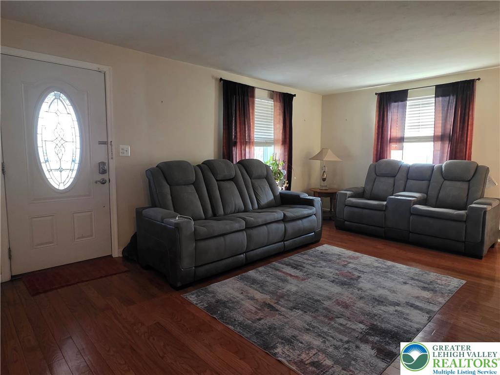 189 West Berger Street Emmaus, PA 18049 - Photo 3 of 26 a living room with furniture a mirror and a window