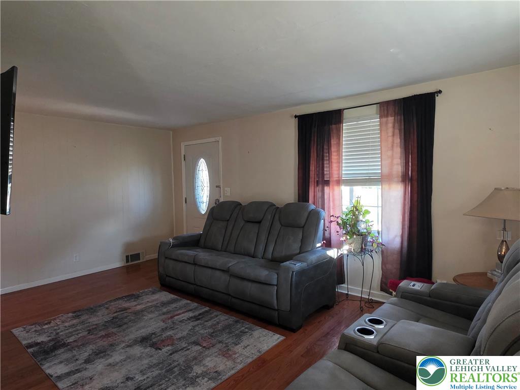 189 West Berger Street Emmaus, PA 18049 - Photo 4 of 26 a living room with furniture and a potted plant