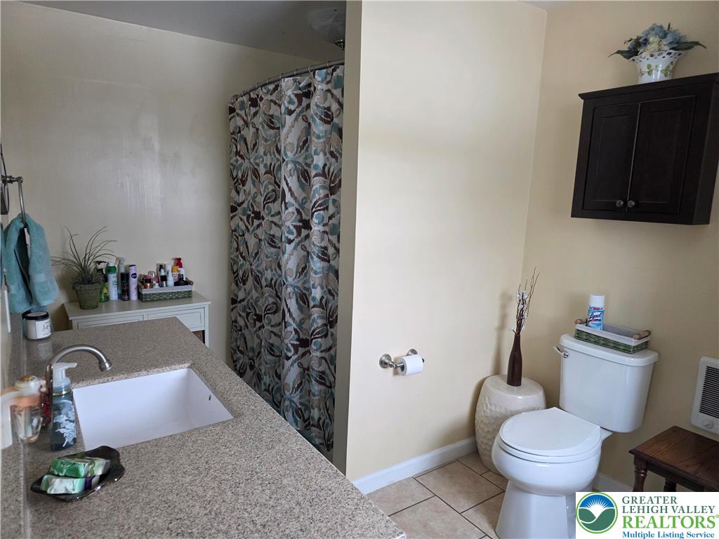 189 West Berger Street Emmaus, PA 18049 - Photo 10 of 26 a bathroom with a toilet and a sink