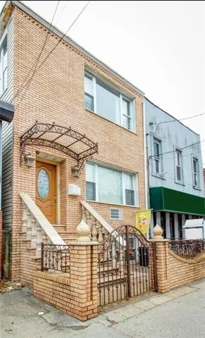 a front view of a house with a porch