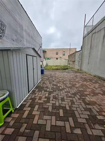 a view of a backyard of a house