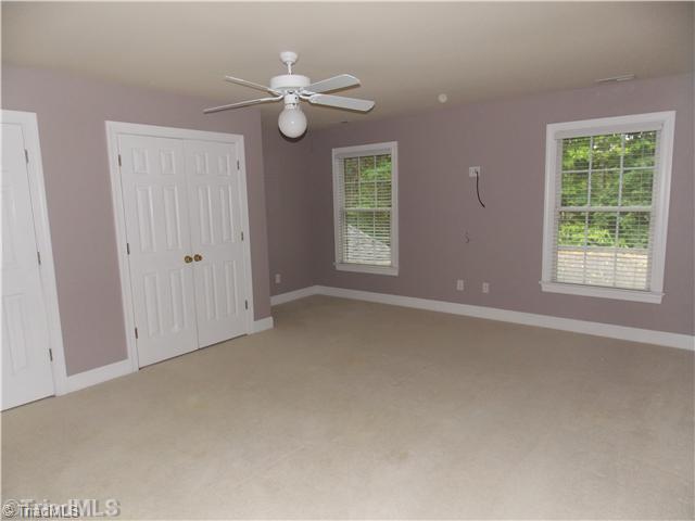 8501 Rosedale Drive Oak Ridge, NC 27310 - Photo 13 of 16 2nd Bedroom. large bedrooms with double closets