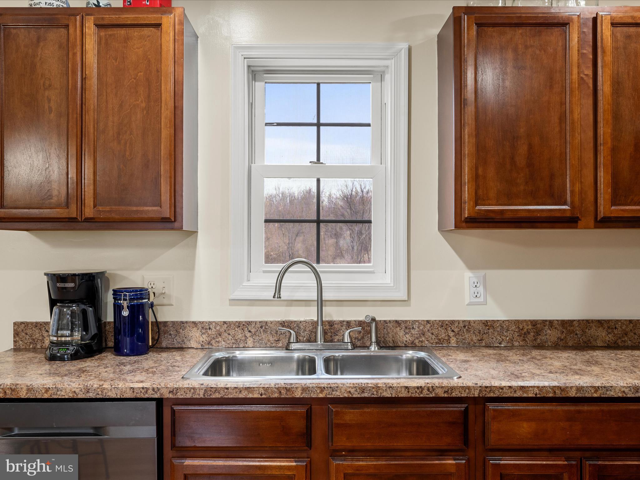 480 Hites Road Stephens City, VA 22655 - Photo 13 of 42 a kitchen with granite countertop stainless steel appliances a sink and cabinets