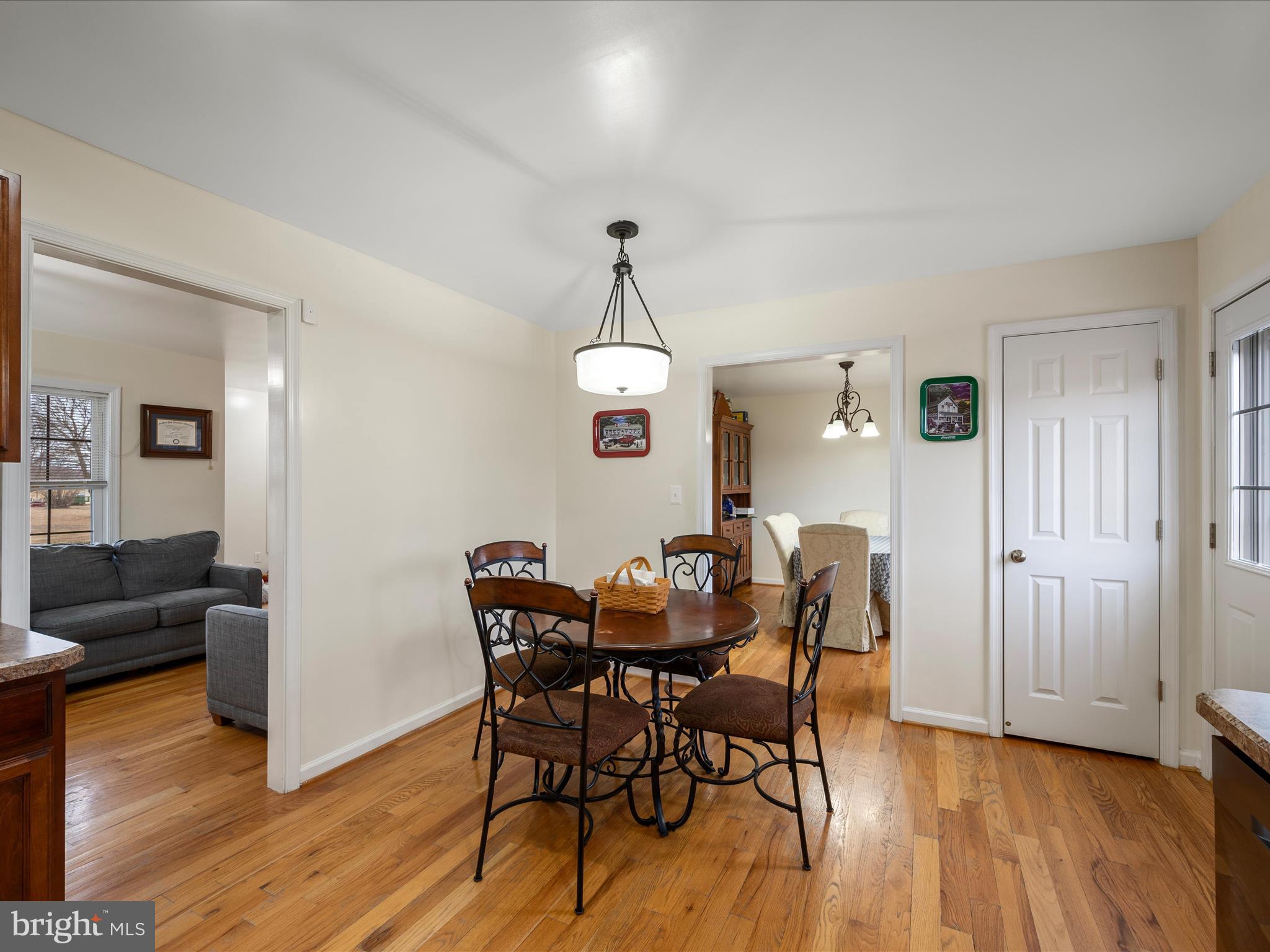 480 Hites Road Stephens City, VA 22655 - Photo 15 of 42 a view of a dining room with furniture and wooden floor
