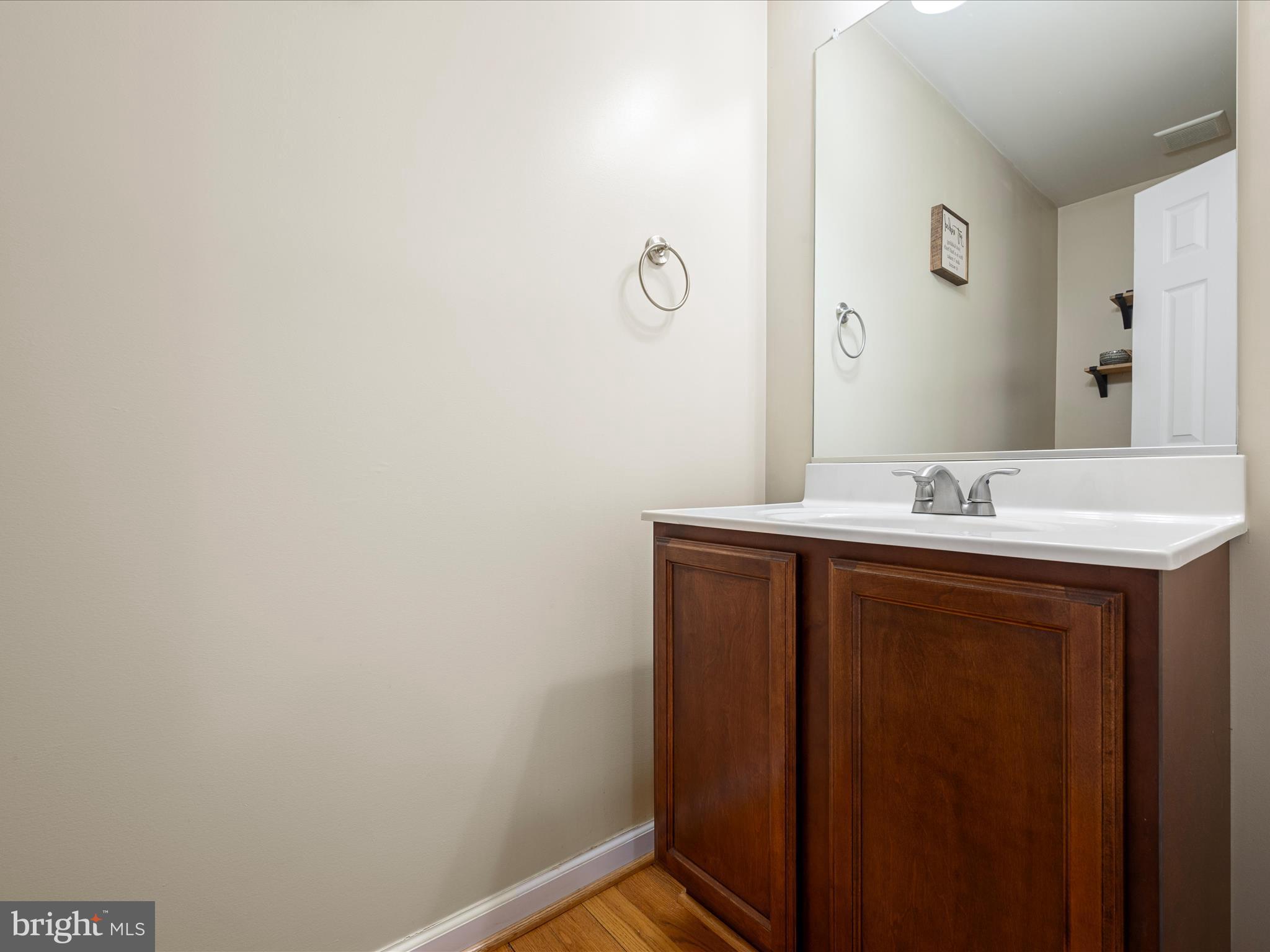 480 Hites Road Stephens City, VA 22655 - Photo 18 of 42 a bathroom with a sink vanity and a mirror