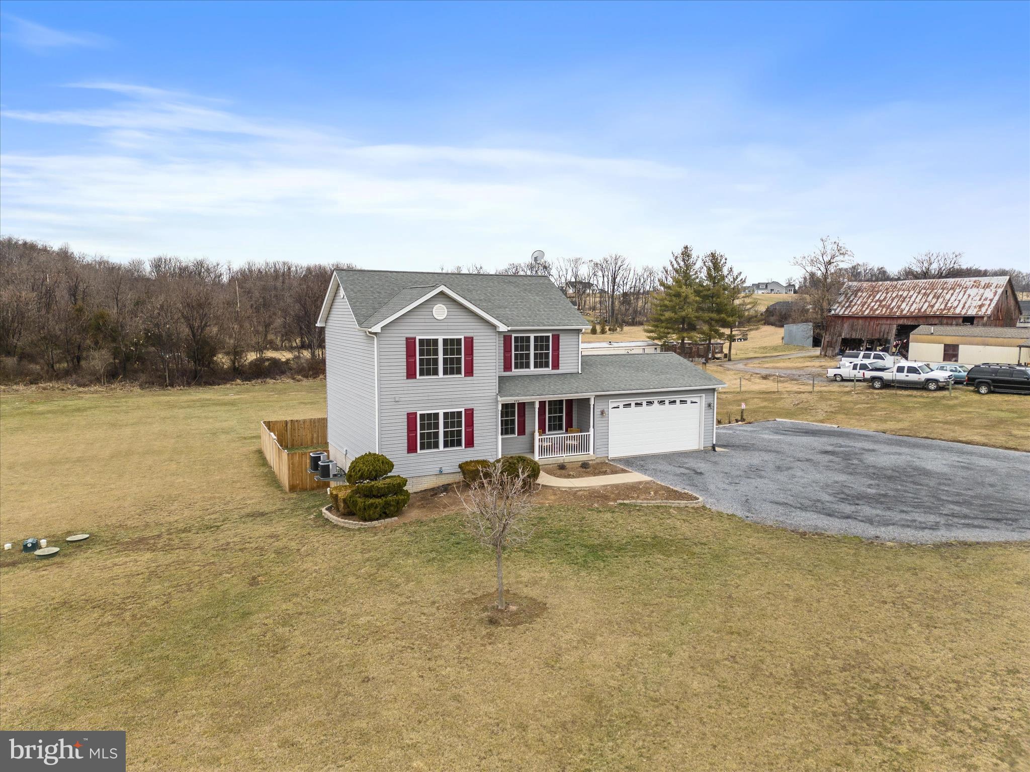 480 Hites Road Stephens City, VA 22655 - Photo 35 of 42 a view of a house with a yard and sitting area