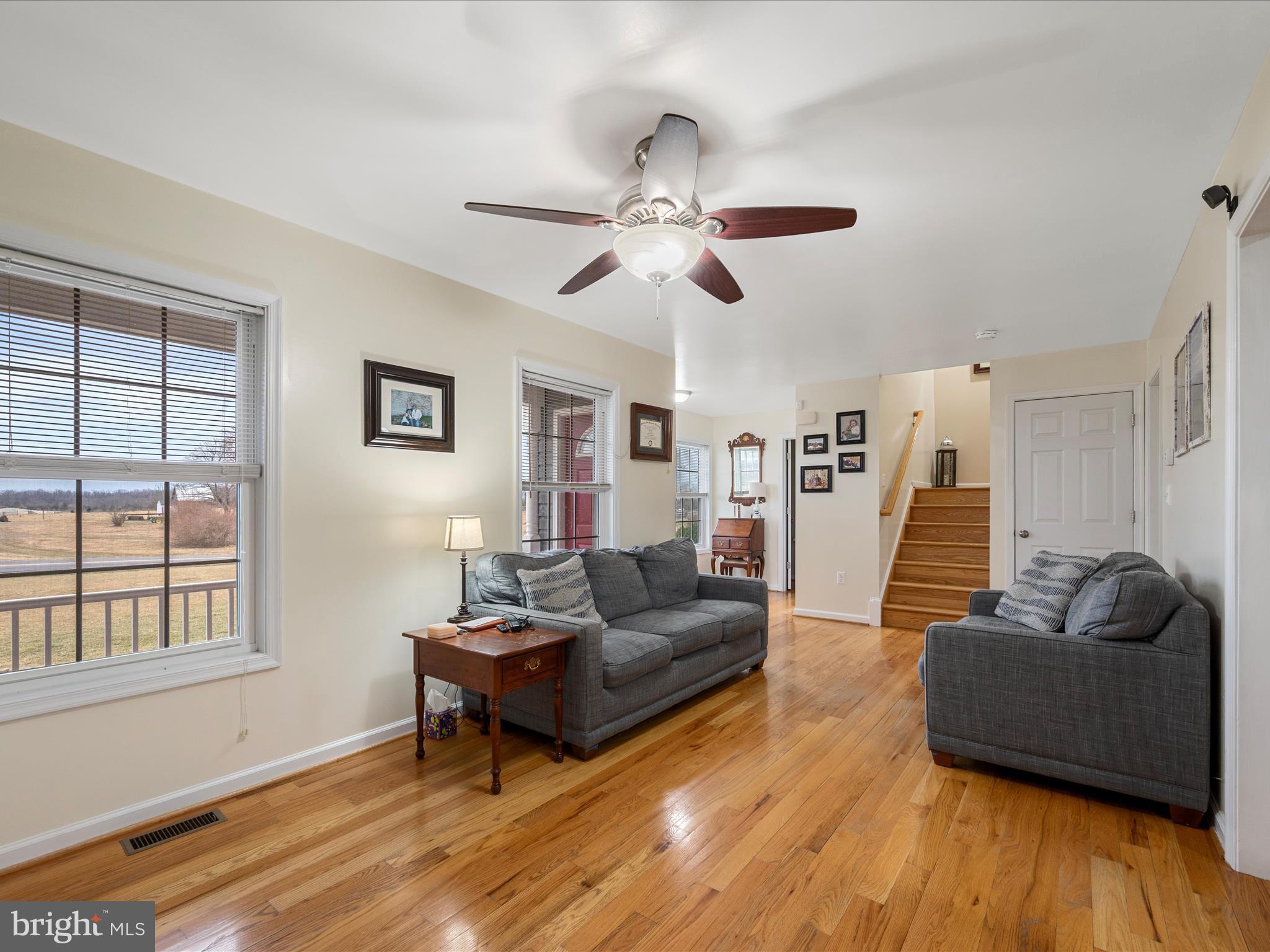 480 Hites Road Stephens City, VA 22655 - Photo 10 of 42 a living room with furniture and a flat screen tv